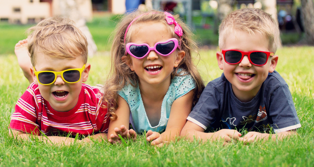 Three silly, playing kids